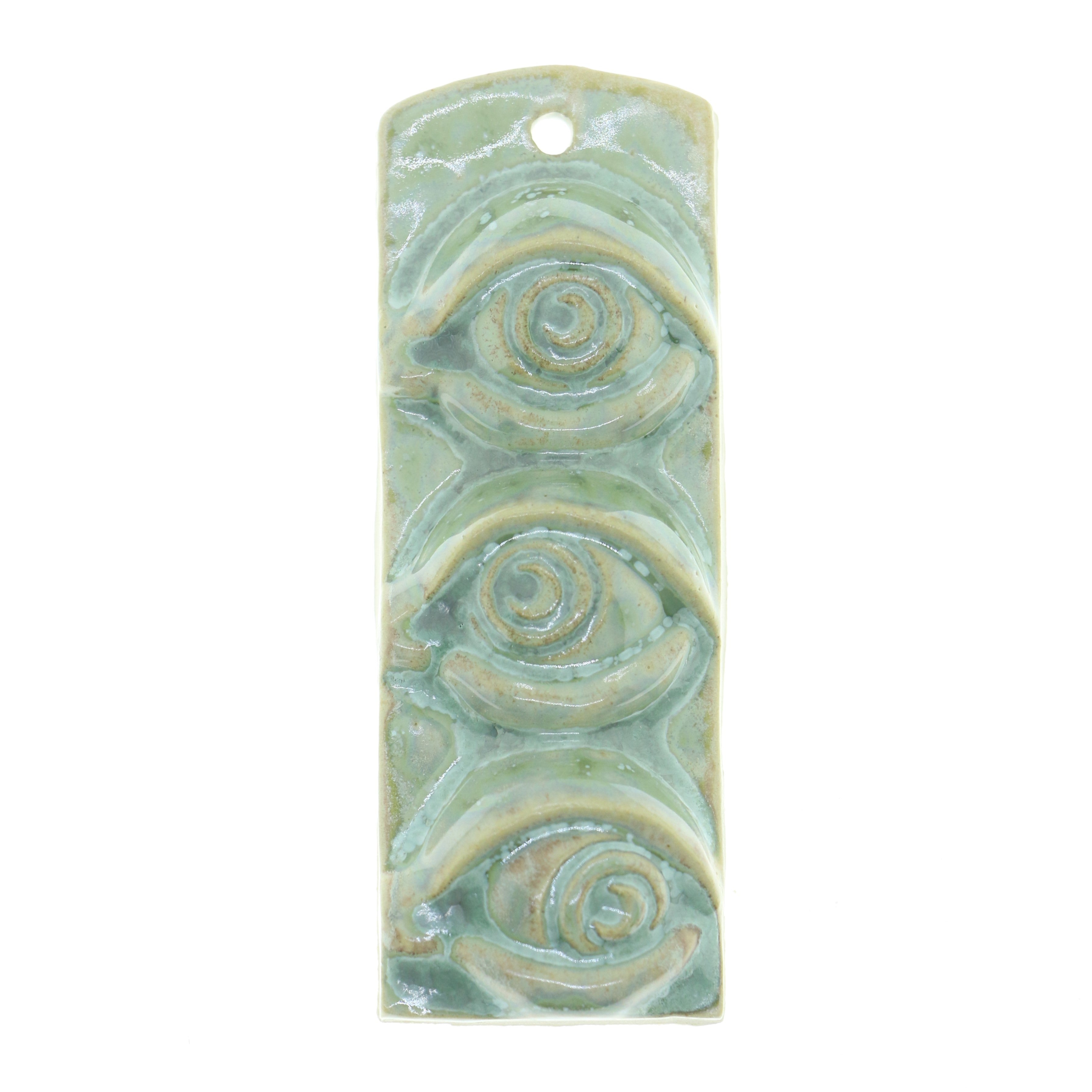 Jacob Larou | Third Eye: Skulptur med 3 øjne i glaseret stentøjsler i CopperGreen til væggen Studio Hafnia