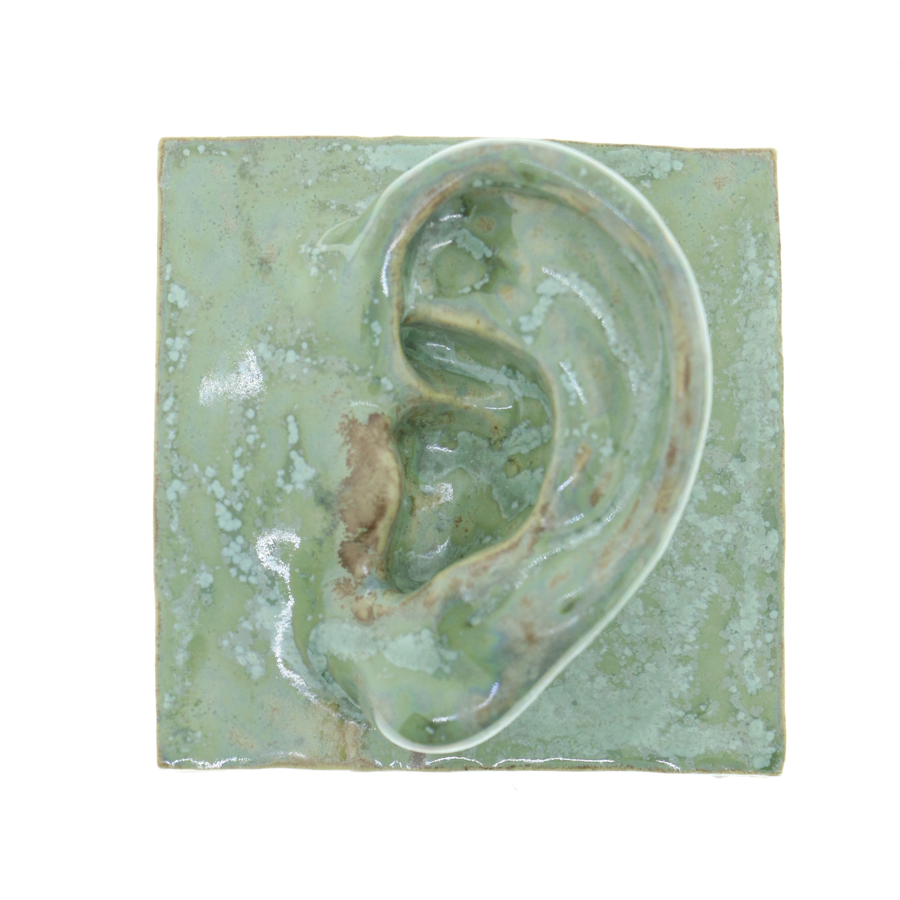 Jacob Laoru | Square Eye (Left): Firkantet øre i glaseret stentøjsler i CopperGreen til væggen Studio Hafnia