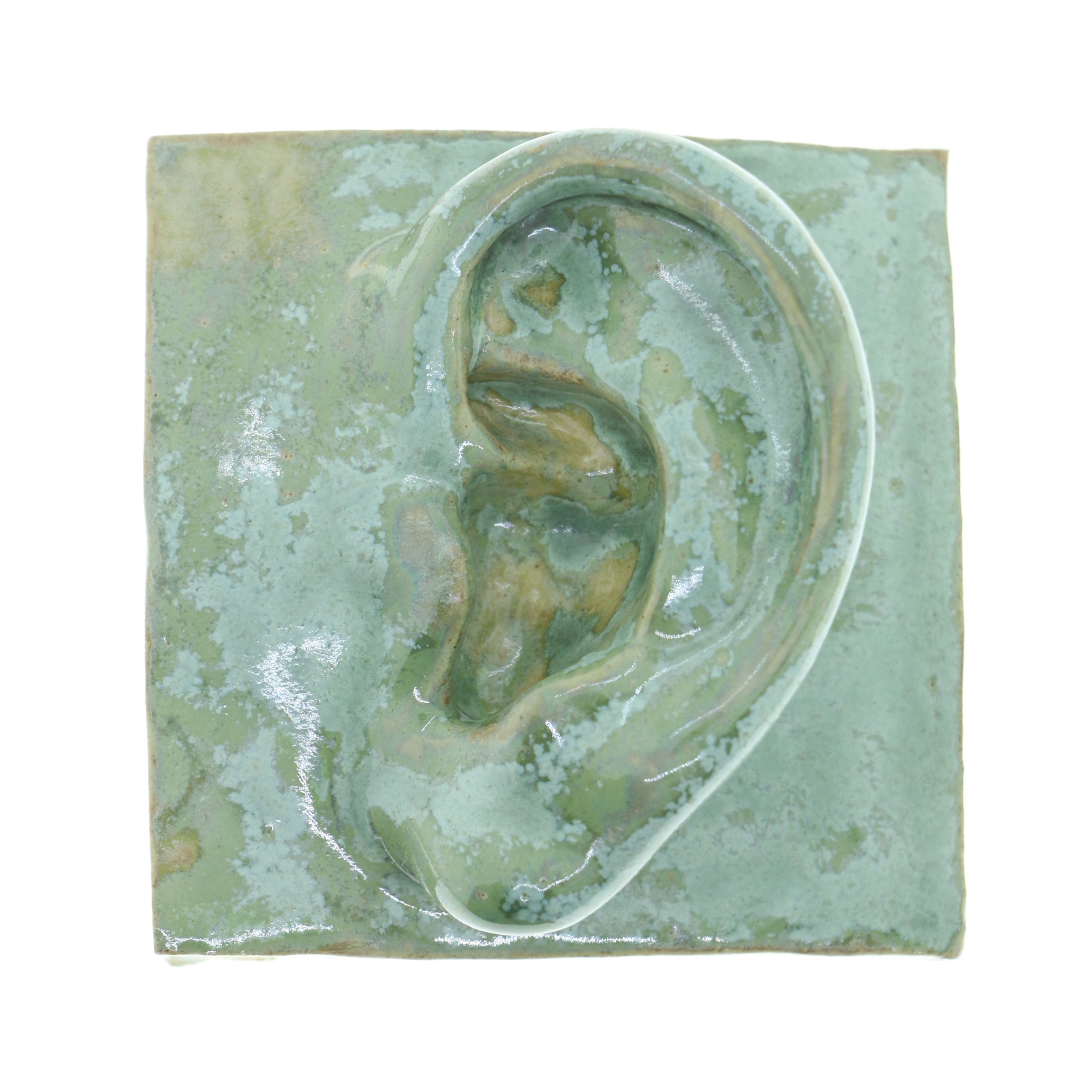Jacob Laoru | Square Eye (Left): Firkantet øre i glaseret stentøjsler i CopperGreen til væggen Studio Hafnia