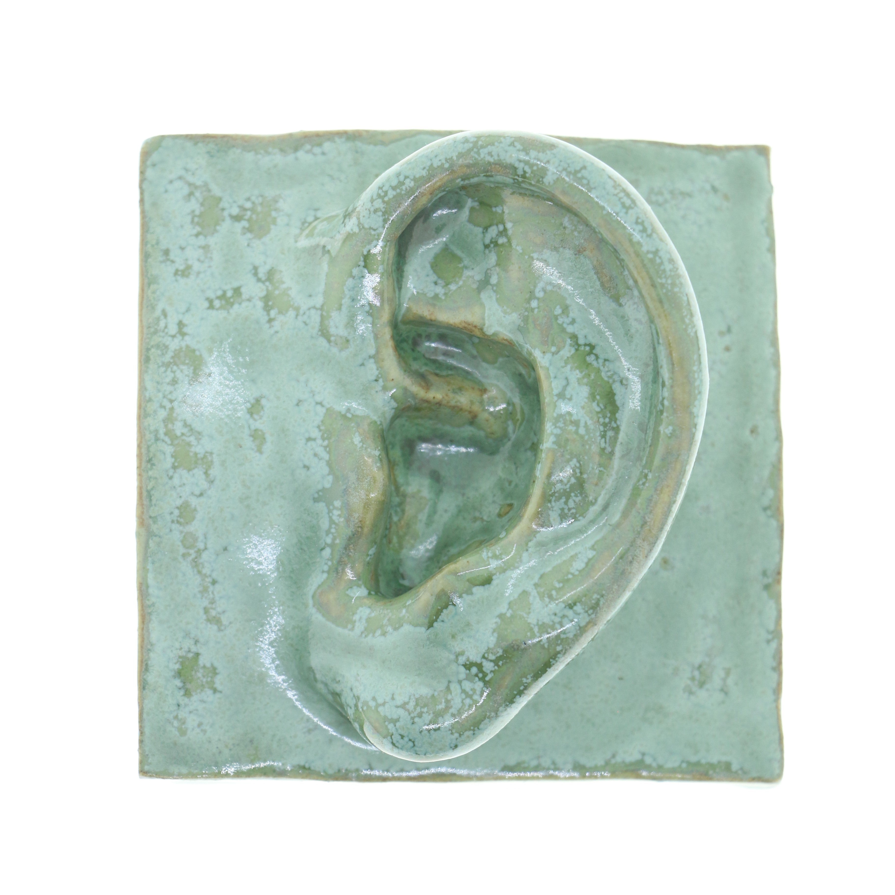 Jacob Laoru | Square Eye (Left): Firkantet øre i glaseret stentøjsler i CopperGreen til væggen Studio Hafnia