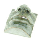 Jacob Laoru | Square Mouth (2): Firkantet mund i glaseret stentøjsler i CopperGreen til væggen Studio Hafnia