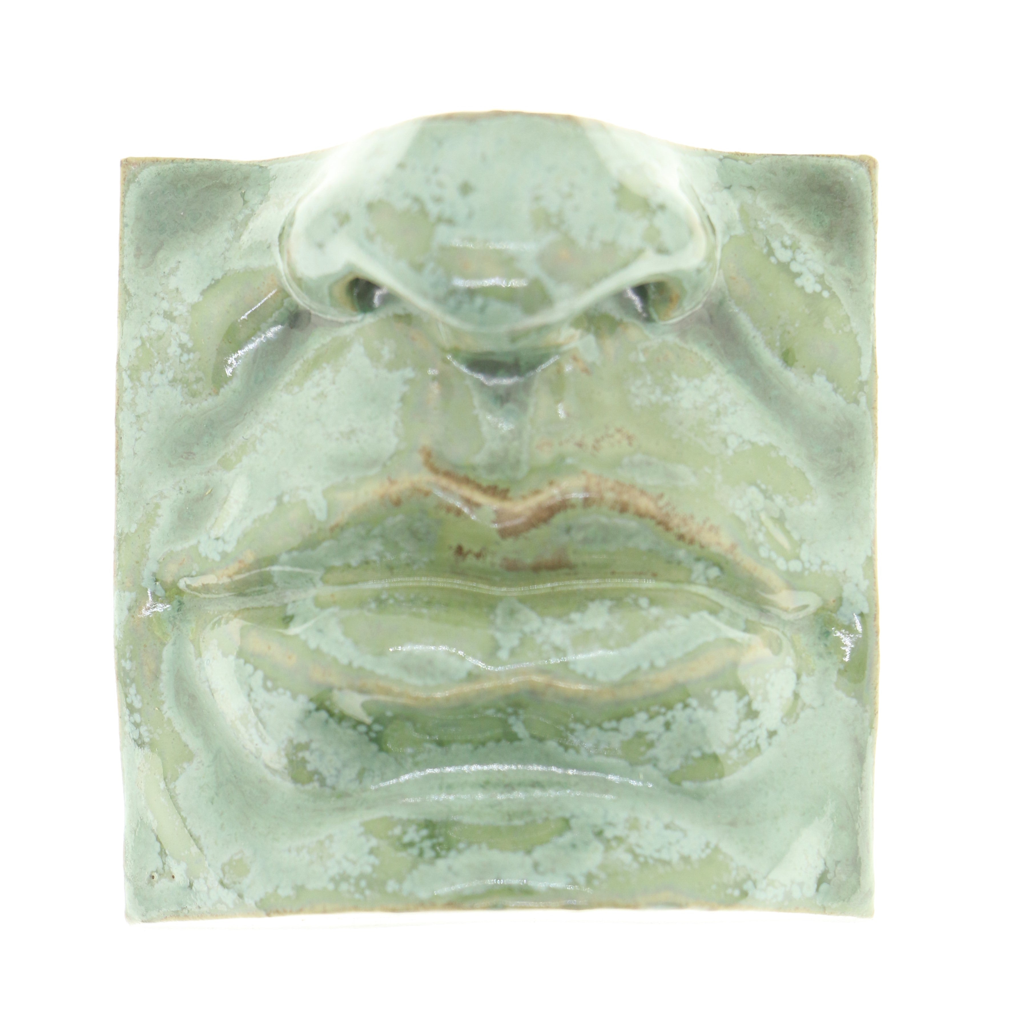 Jacob Laoru | Square Mouth (2): Firkantet mund i glaseret stentøjsler i CopperGreen til væggen Studio Hafnia