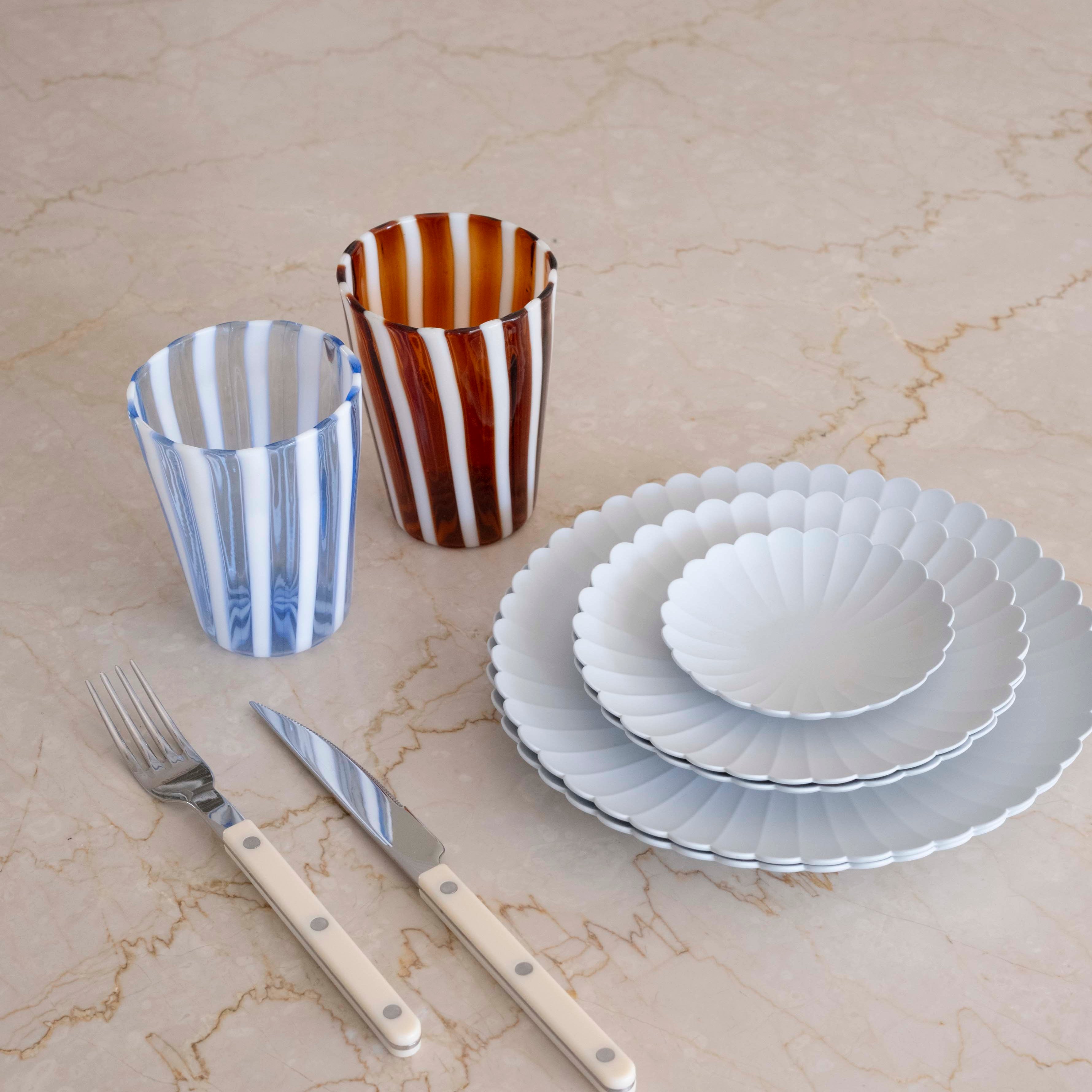 Studio Hafnia collection table setting with Arita Japan plates, Sabre Paris cutlery, and hand-blown Murano drinking glasses