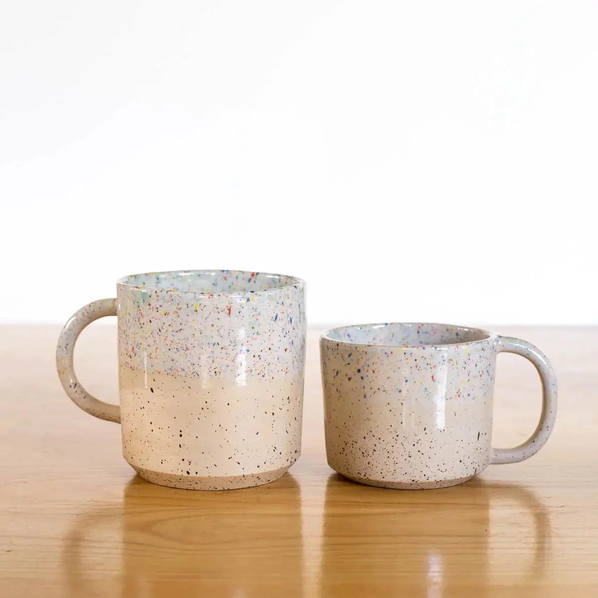 Two handcrafted Sprinkles ceramic mugs by Minuit Céramique – French design, exclusively at Studio Hafnia.