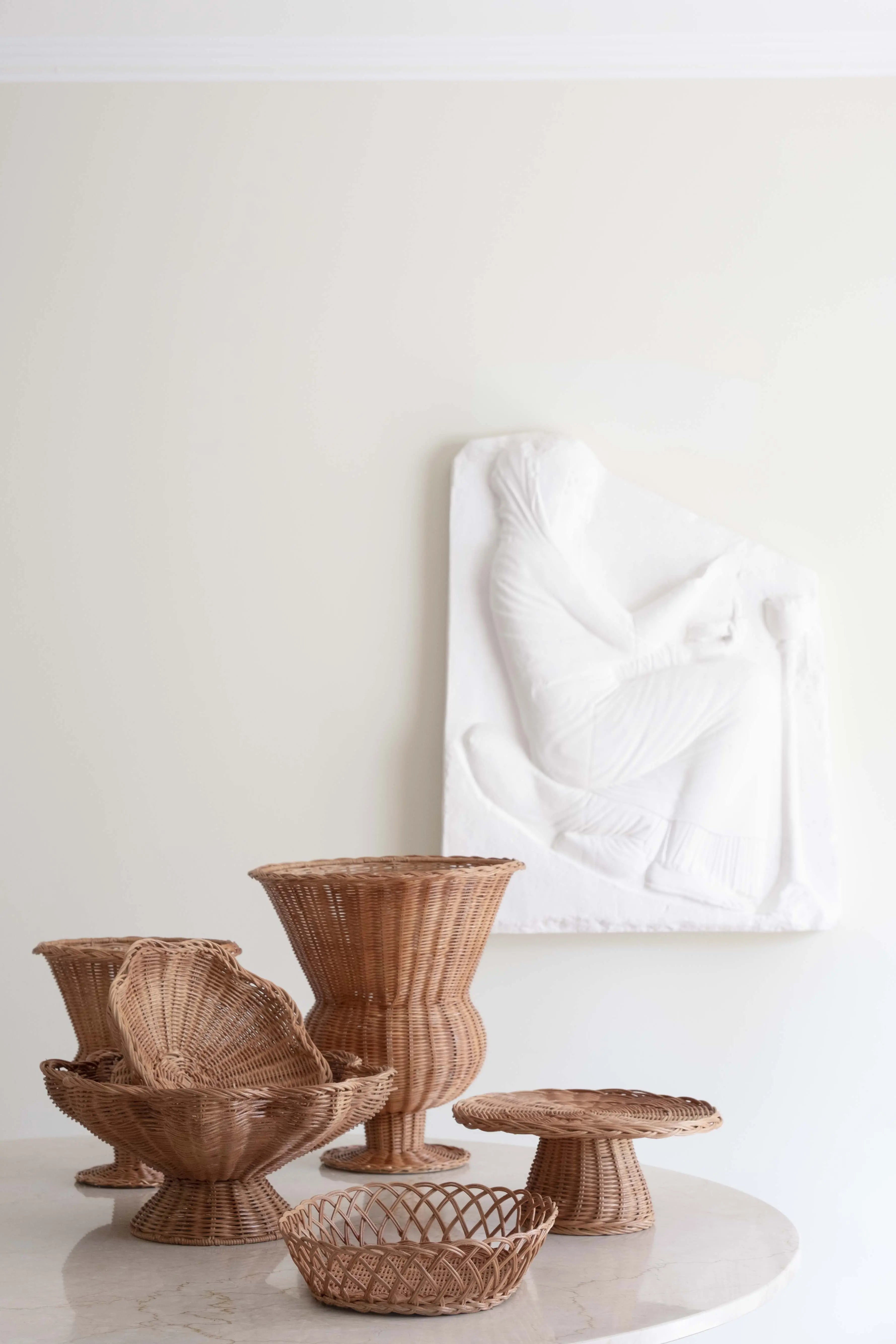 Handmade rattan products from Vietnam – vase, cake stand, and bread basket from Studio Hafnia