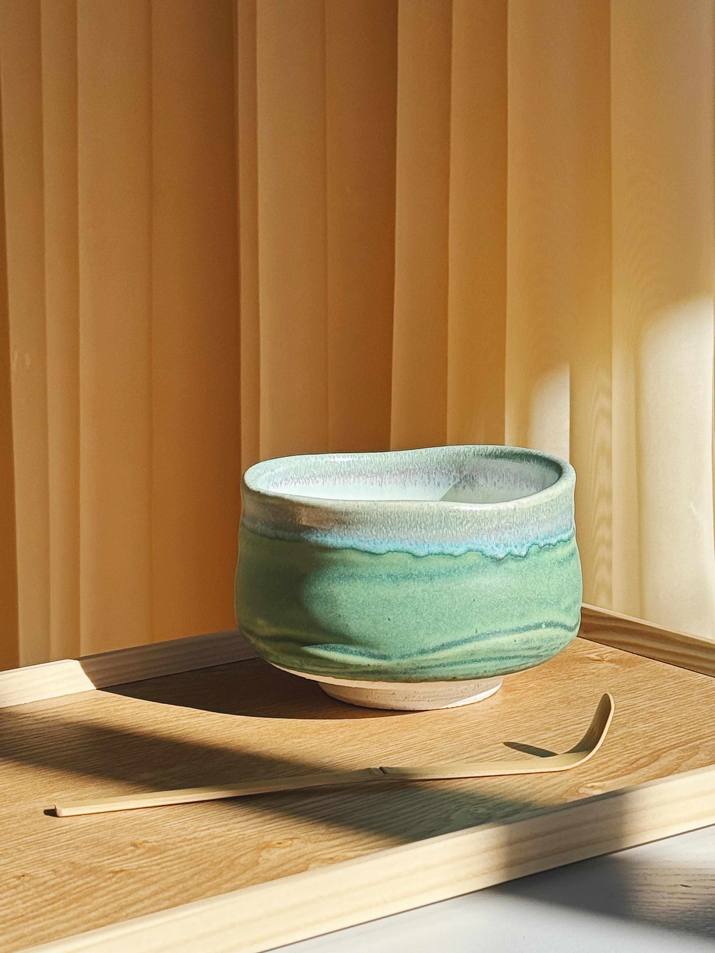 Japanese matcha bowl (chawan) with green glaze – traditional ceramic tea bowl for whisking and drinking matcha.