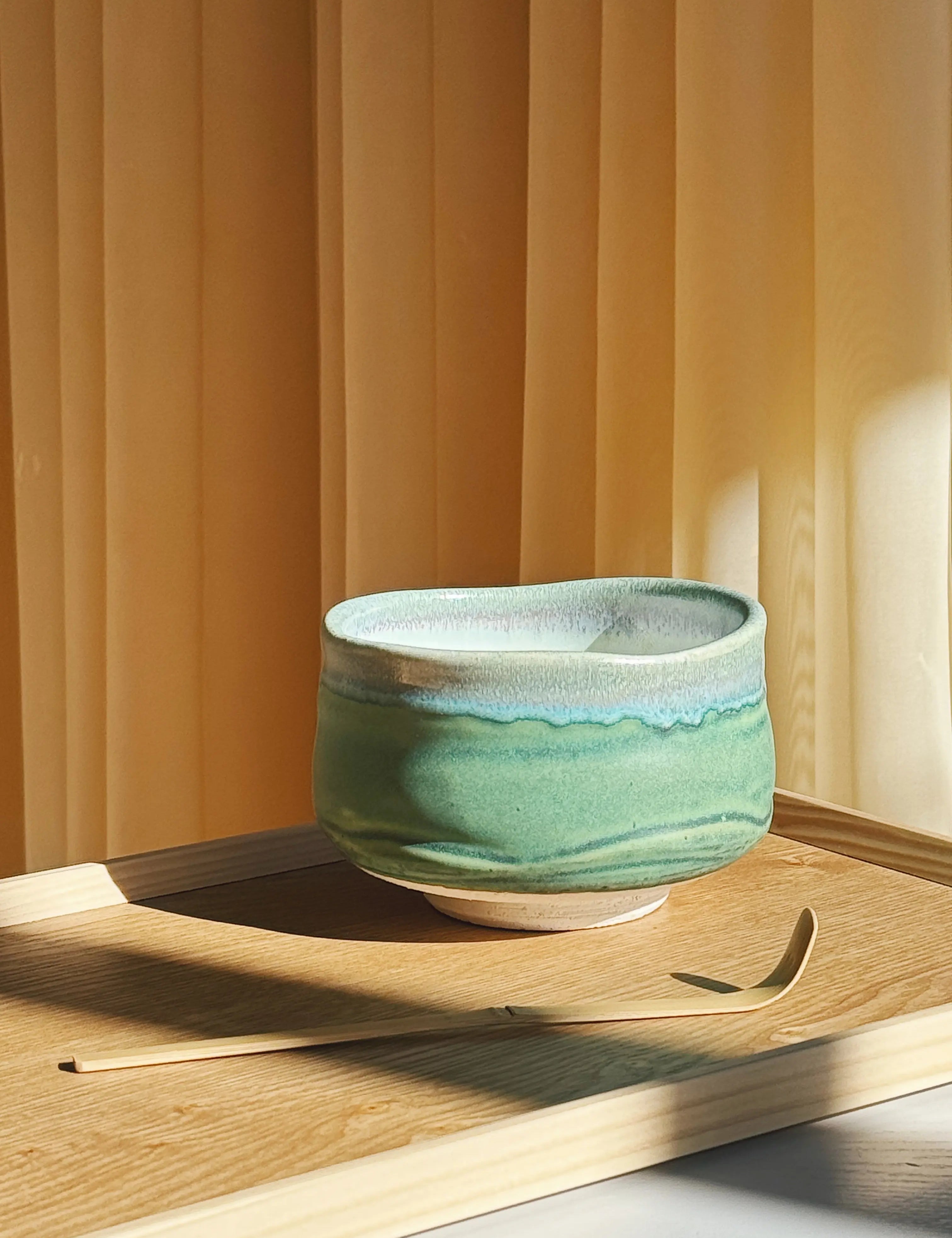 Japanese matcha bowl (chawan) with green glaze – traditional ceramic tea bowl for whisking and drinking matcha.