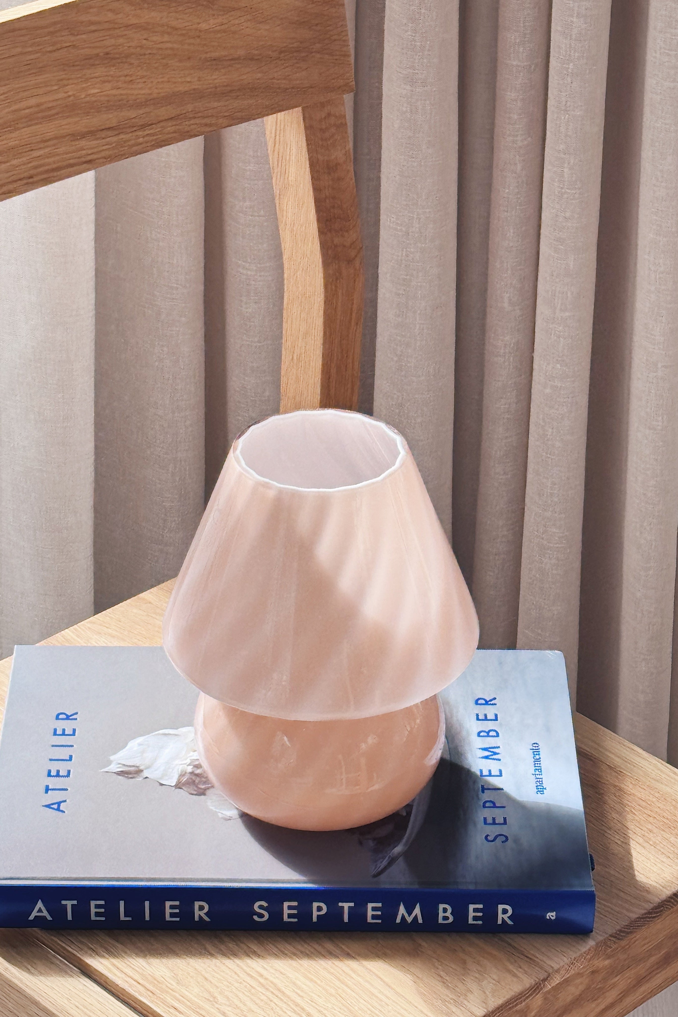 Pink vintage Murano mushroom table lamp seen from above with swirl pattern in the shade