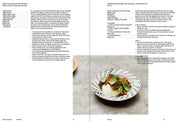 Recipe for granola with honey and olive oil served with yoghurt on a patterned plate