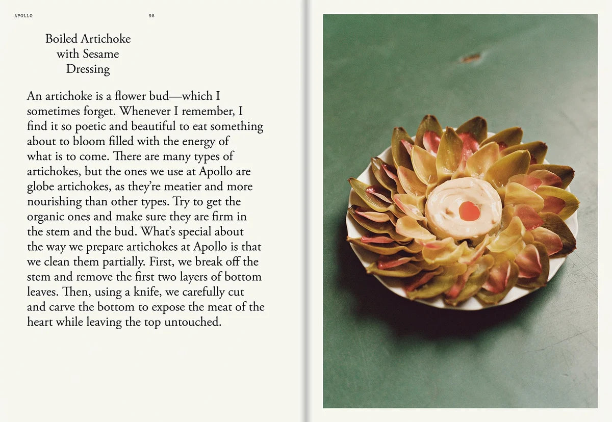 Recipe for boiled artichoke with sesame dressing served on a white plate against a green backdrop