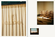 Apollo logo on a light curtain backlit by the sun and the empty dining room with wooden chairs stacked on the tables