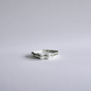 Musling underkop/sidetallerken af Christina Iversen Studio i creme, keramik Christina Iversen Studio