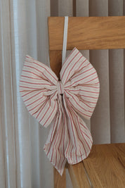 Handmade Christmas bow in red and white striped cotton with hanging loop, 20 x 30 cm