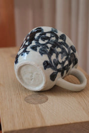 Japanese cup with hand painted blue pattern