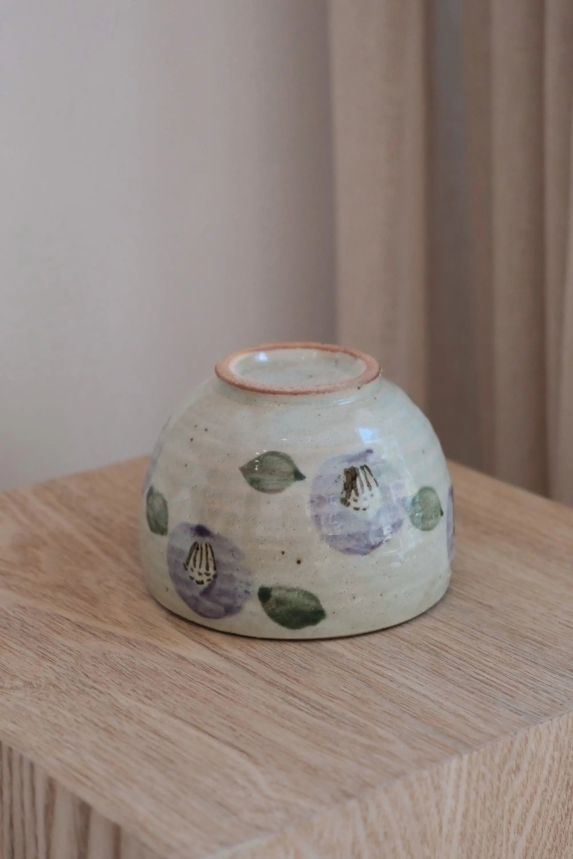 Japanese porcelain cup with purple camellia and brown rim (310 ml)