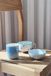 Chrysanthemum bowl with thin blue stripes