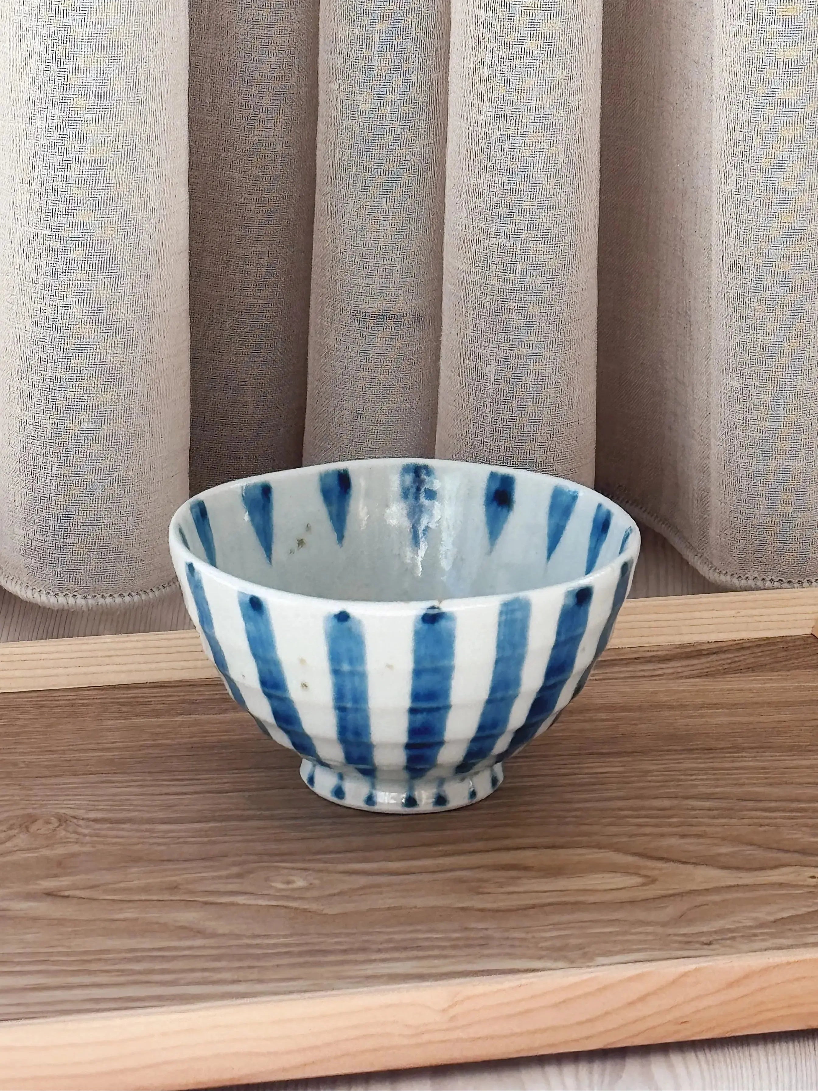 Japanese bowl with wide, blue stripes