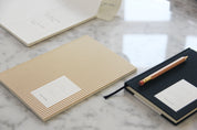 Notem studio, Vita notesbog, Softcover medium, Ochre lines Notem studio