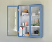 Stillark Colour Cabinet 01 in Misty Blue in a living room with ceramics behind the glass, Studio Hafnia