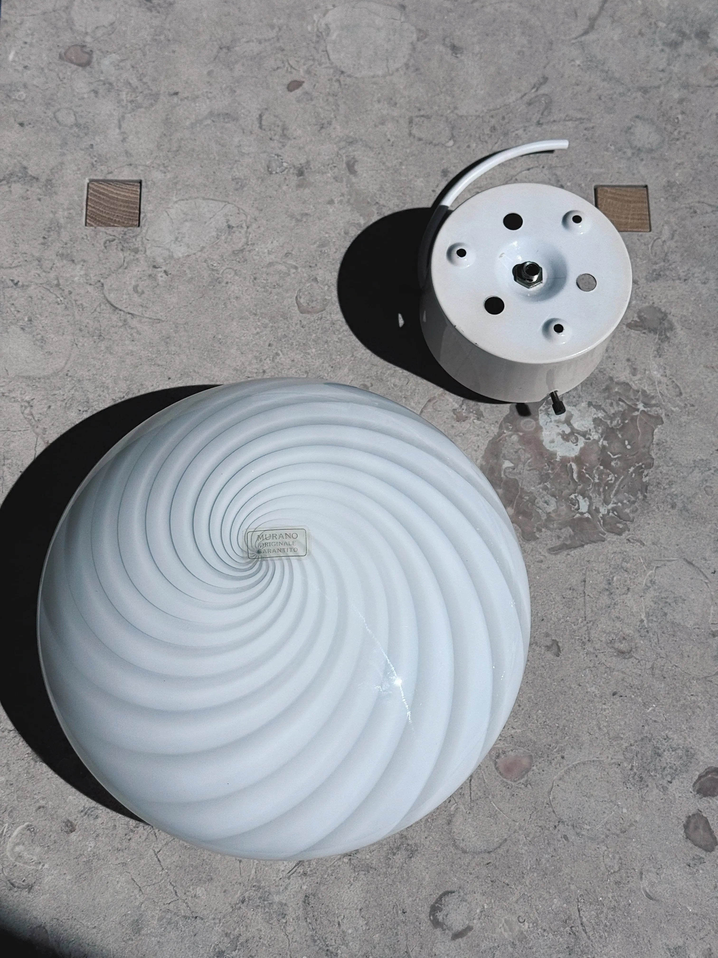 Detail of the swirl pattern in white opal glass on vintage Murano flush mount