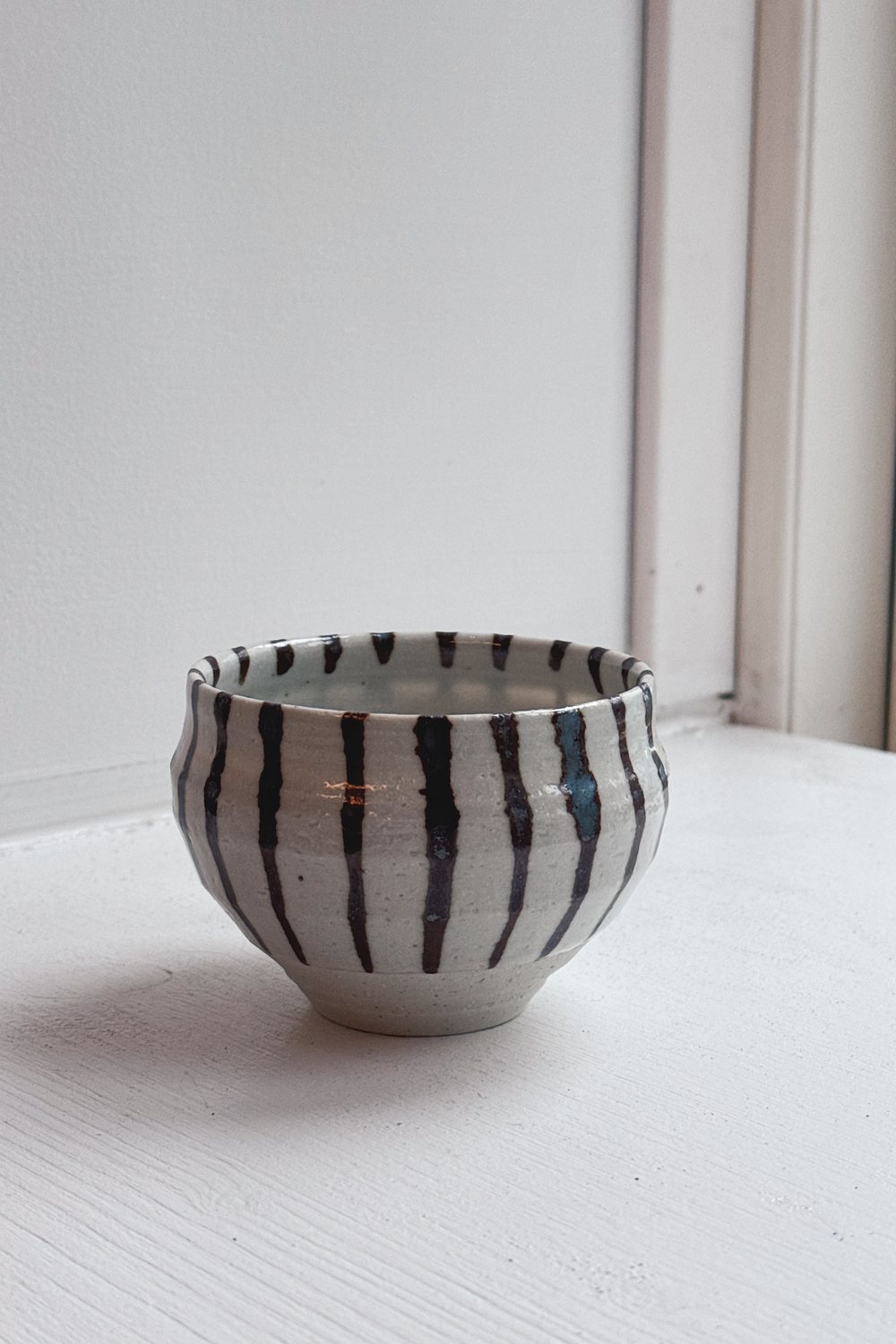Japanese ceramic mug in brown and white striped glaze with an organic shape, no handle, Studio Hafnia
