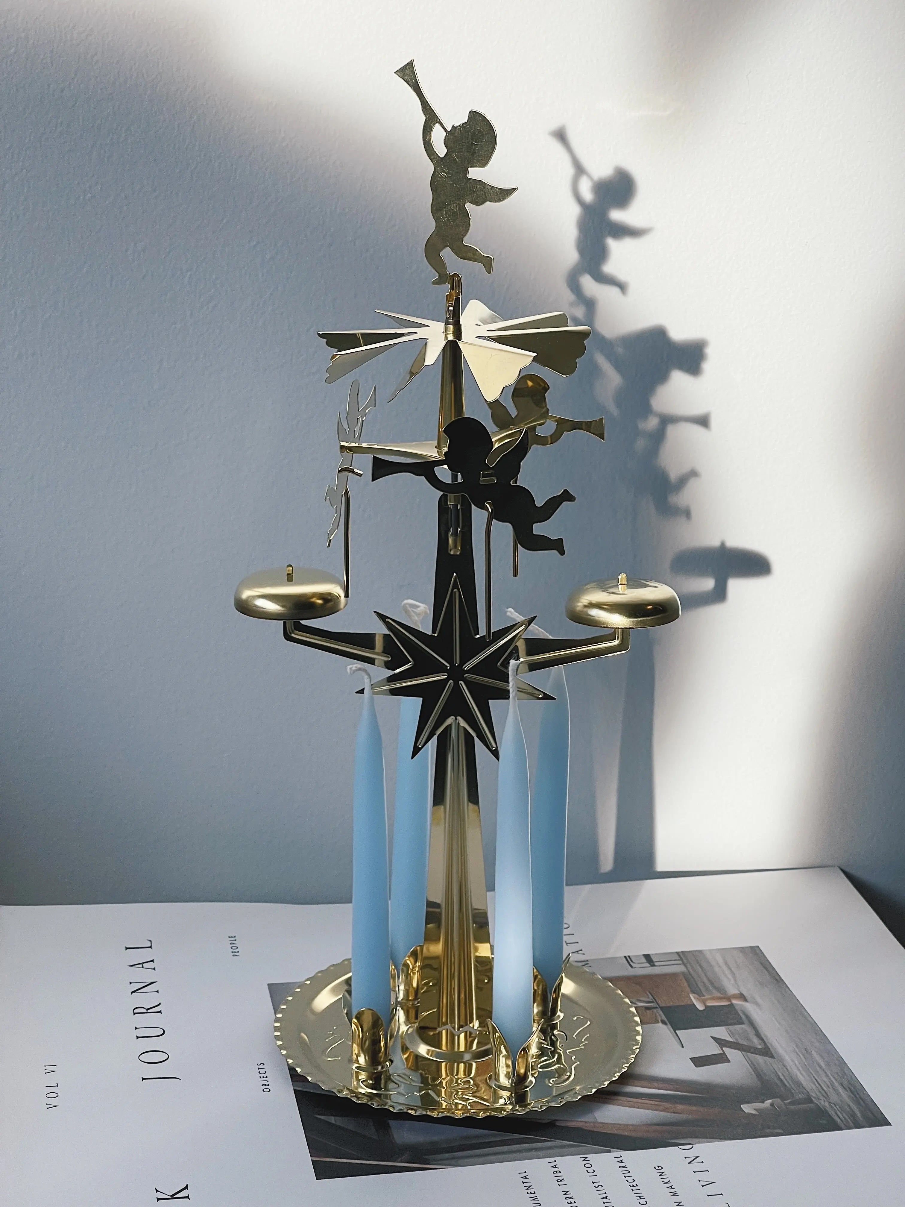 kunstindustrien-dinner-candles-light-blue-angel-chimes-studio-hafnia.jpg