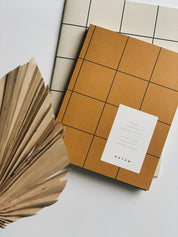 Notem studio, Uma notesbog flat lay, Softcover medium, Ochre Notem studio
