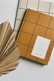 Notem studio, Uma notesbog flat lay, Softcover medium, Ochre Notem studio
